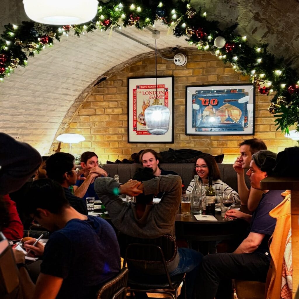 Draughts London interior shot - group having a great time